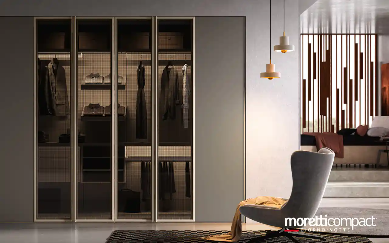 Portale a “raccordi” per chiusura in nicchia con ante soffietto